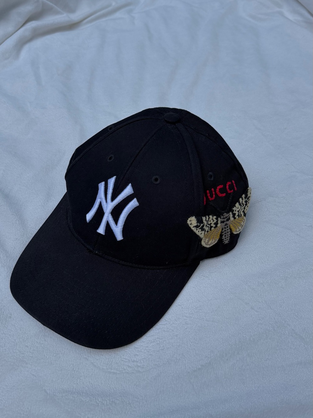 Gucci Black Kids Baseball Cap with White NY Logo and Embroidered Butterfly